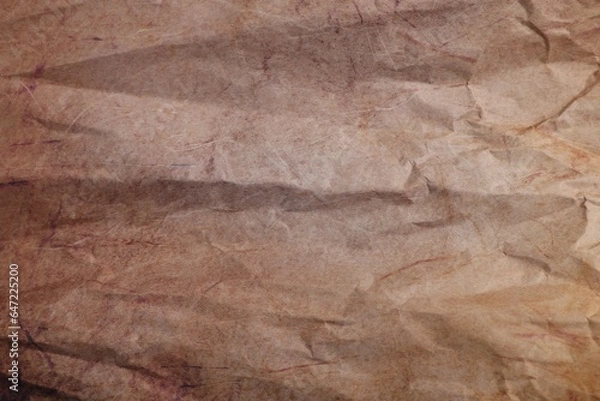 Fototapeta Texture of crumpled parchment paper as background, top view
