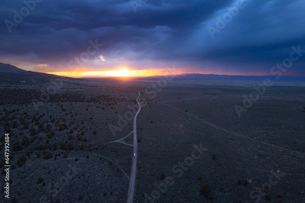 Obraz Storm over the plains at sunset