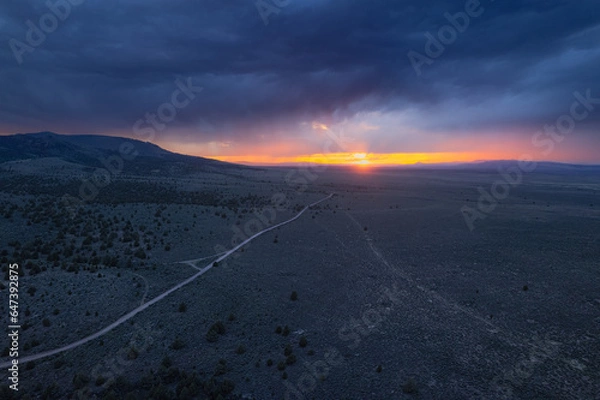 Obraz Storm over the plains at sunset