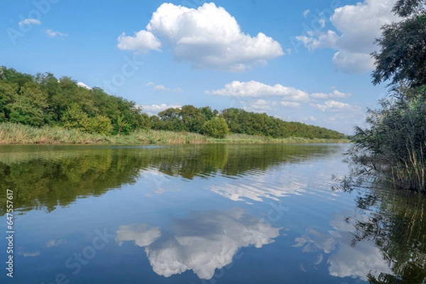 Obraz landscape. clouds are reflected in the river