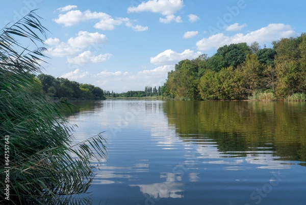 Obraz landscape. clouds are reflected in the river