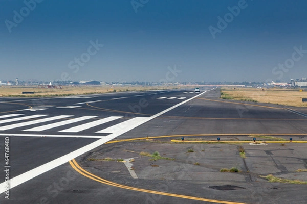 Fototapeta Zebra crossing on the runway of an airport, Benito Juarez Intern