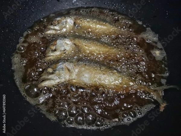 Obraz Fried mackerel in boiling oil