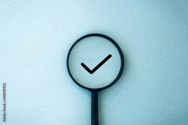 Fototapeta Magnifying glass and check mark icon. Business concept,idea,right choice, quality control, approval and contract assignment