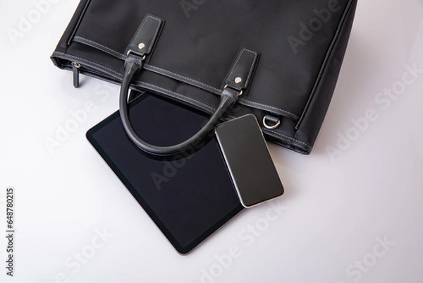 Obraz ビジネスバッグとタブレット端末。ビジネスイメージ