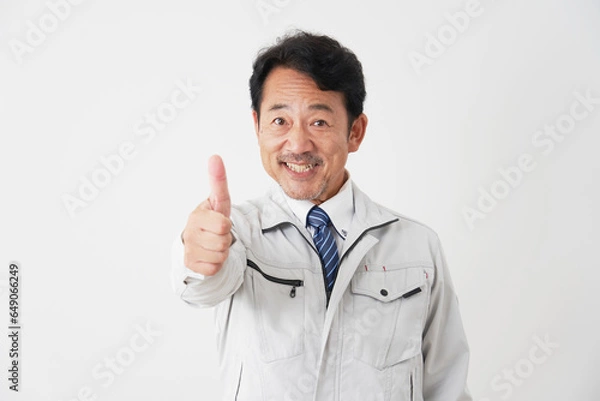 Fototapeta グッドポーズをする作業員　白背景