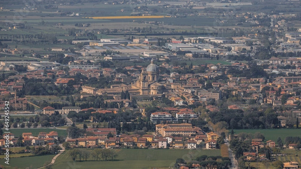 Fototapeta Bastia Umbra is a commune in Italy, located in the Umbria region, subordinate to the administrative center of Perugia. View from the ancient city of Assisi.