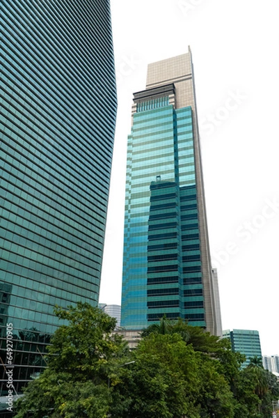 Obraz skyscrapers in downtown city. city building landscape. many high building is like city landmark of metropolis amazing for design or brochure or company profile. High building transparent. Cityscape