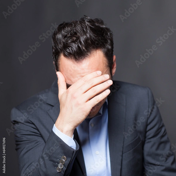 Fototapeta Depressiver Geschaeftsmann