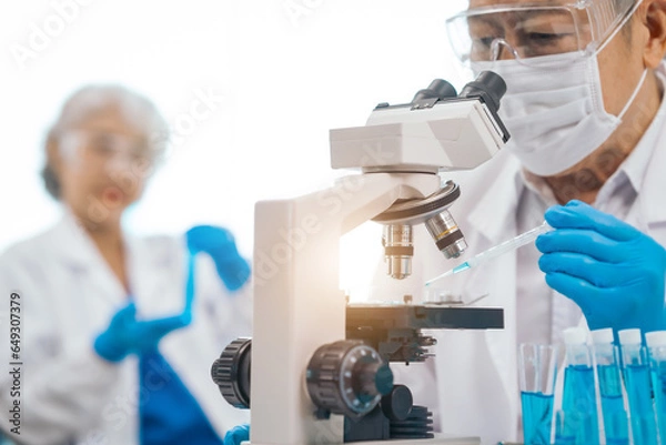 Fototapeta Mature physician asian man and woman people in comprehensive presentation on medical insurance, health lab test results, empowering patients with knowledge. physician expert advice on health coverage