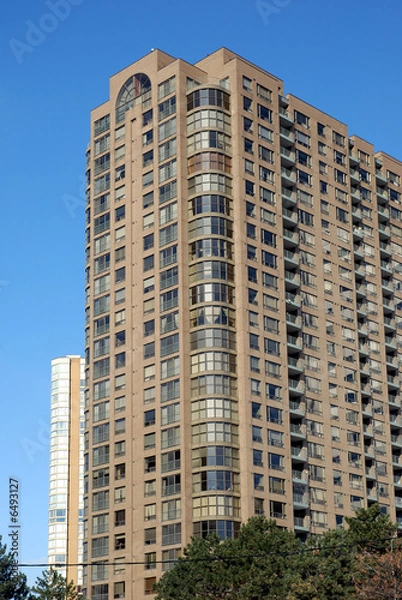 Fototapeta Highrise brick apartment builidng