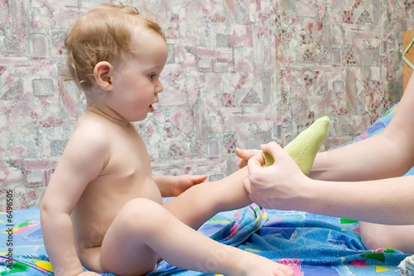 Obraz smiling baby after the bath clothing sock