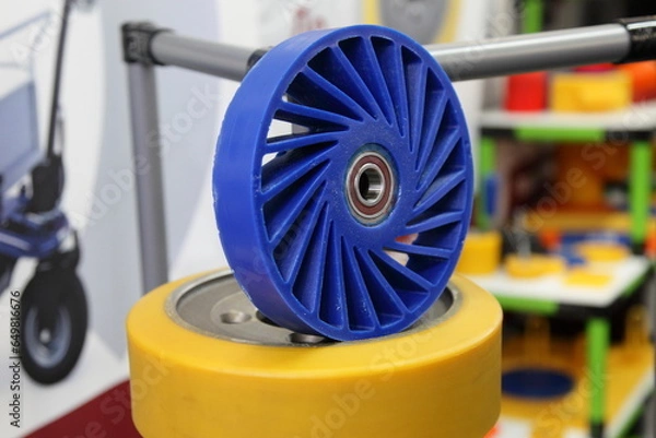 Fototapeta wheels, rollers, automotive, background, closeup, colored, detail, engineering, equipment, modern, new, polyurethane, polyurethane tire, polyurethane wheel, production, round, spare, technology, textu
