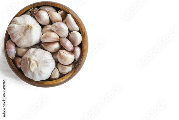 Obraz Garlics in wooden bolw  on white wooden planks background.  have path