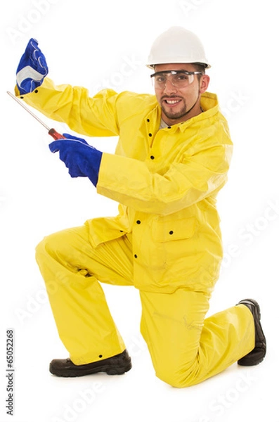 Fototapeta man with screwdriver protective suit
