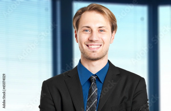 Fototapeta Smiling businessman portrait