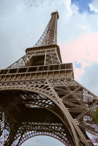 Fototapeta Paris, France - April 3 2019: View on Eiffel Tower in Paris from below