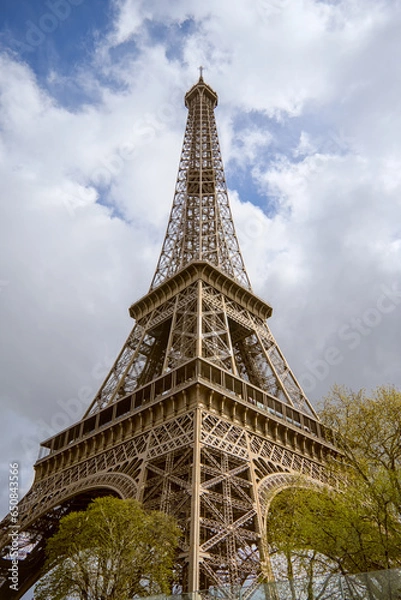 Fototapeta Paris, France - April 3 2019: View on Eiffel Tower in Paris from below