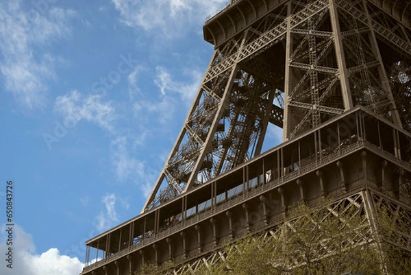 Fototapeta Paris, France - April 3 2019: View on Eiffel Tower in Paris from below