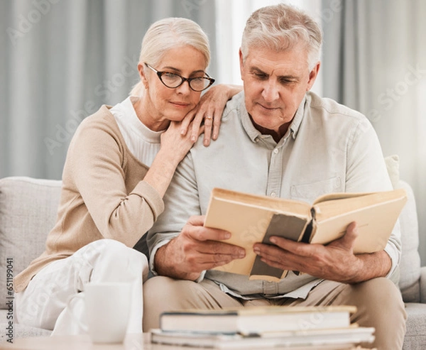 Fototapeta God, worship and senior couple with bible on a sofa relax with scripture, study or reading in their home. Holy, book and retired people in a living room with gospel, faith and Jesus Christ praise