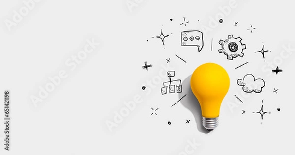 Obraz Brainstorming concept with a light bulb - Flat lay