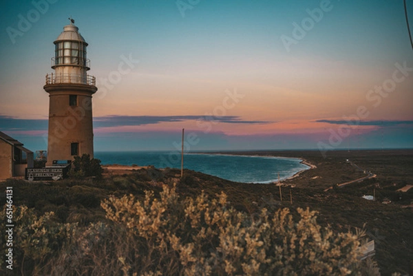 Fototapeta lighthouse at sunset