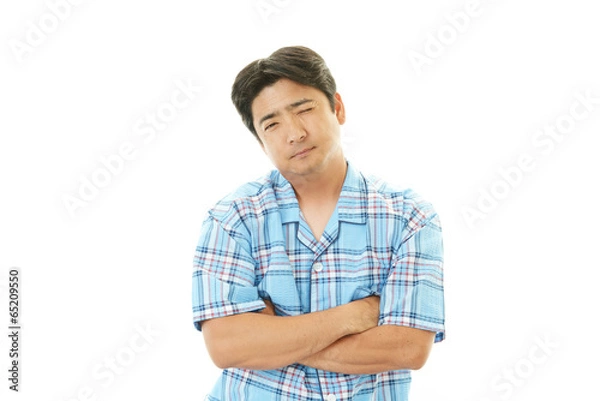 Fototapeta 疲れた表情の男性