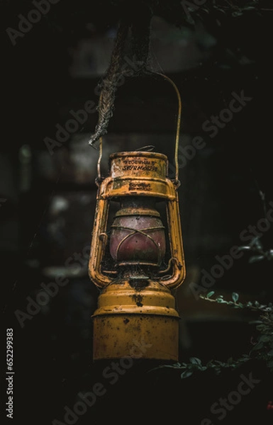 Obraz old lantern on black background