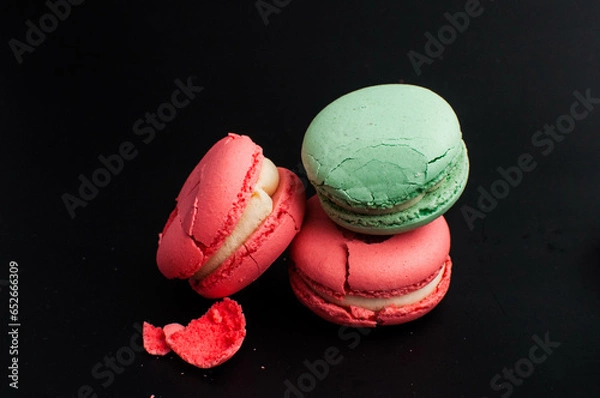 Obraz crushed multi-colored macaroons on a white background