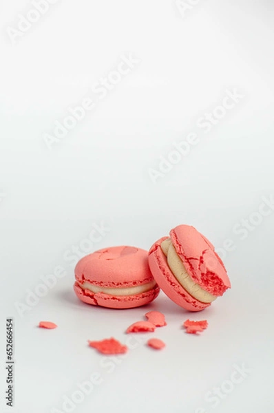 Obraz crushed pink macaroons on a white background