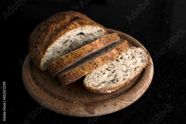 Obraz grain bread on a wooden board