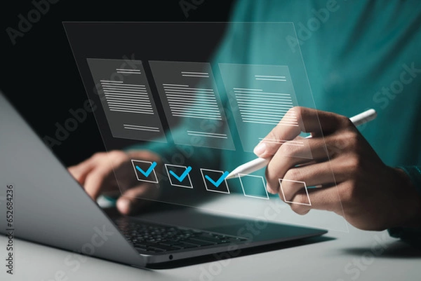 Obraz Survey form concept. Businessman filling survey form online, answer question of test, poll, questionnaire, business assessment, survey customer digital.