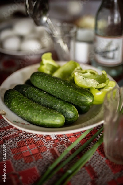 Fototapeta fresh cucumbers on the table