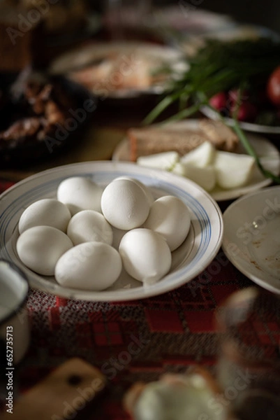Fototapeta Eggs on the dining table 