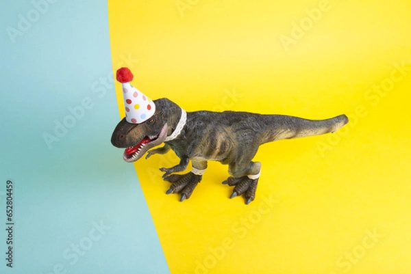 Obraz a dinosaur, dressed up in lace and a paper party hat