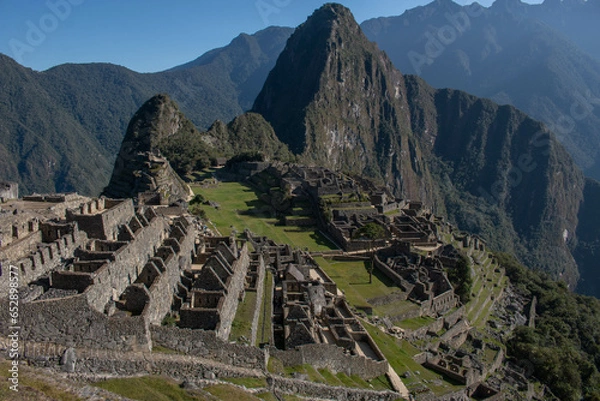 Fototapeta Panorama of Machupicchu with view of the mountains and the archeological site, in Peru, Sacred Valley. 