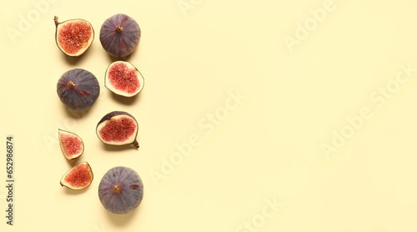 Fototapeta Fresh ripe figs on yellow background with space for text, top view