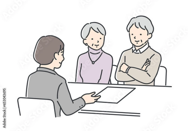 Obraz 担当者の説明を聞くシニア夫婦