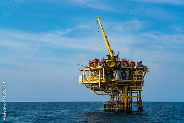 Fototapeta Offshore oil and gas wellhead remote platform which produced raw material for sent to onshore refinery, power generation and petrochemical industry.