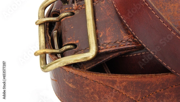 Obraz Leather belt with a buckle on a white background. Close-up.
