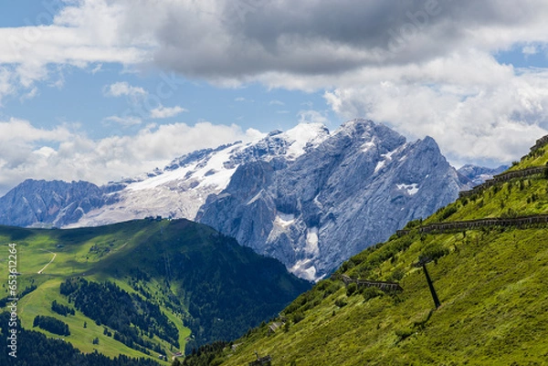 Fototapeta A view of the Marmolada and the countryside into Val di Fassa