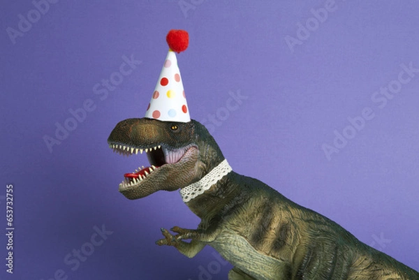 Obraz violet a dinosaur, dressed up in lace and a paper party hat