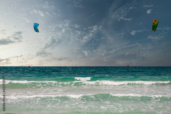 Obraz kite surfing with a beautiful blue sea and backdrop. High-quality photo