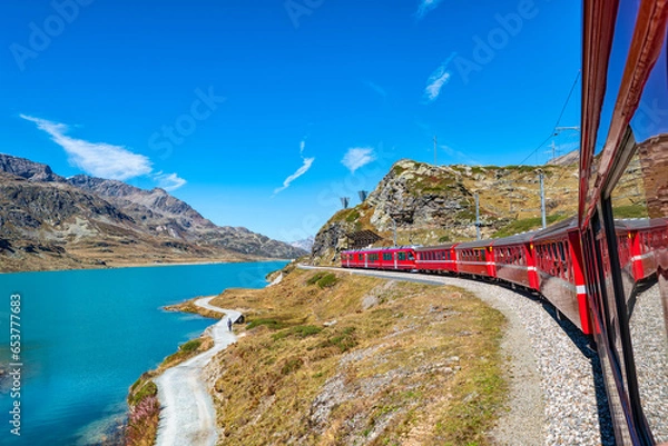 Fototapeta Red train of Bernina in the Swiss alps