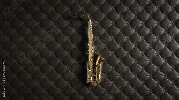 Obraz Schönes Saxophon auf Leder Hintergrund