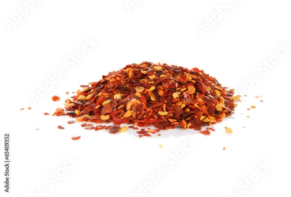 Obraz Pile of red pepper flakes on a white background