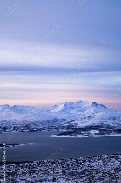 Fototapeta Evening view from the top of the mountain in Tromso, Norway. Polar circle, in winter. Fjord, polar sea. Dark evening. Breath-taking view. Town, city from the top, drone view, on island. Polar night