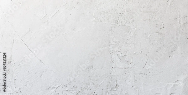 Fototapeta Close up of texture white putty or plaster on the wall, creating a smooth and clean surface for interior finishing.