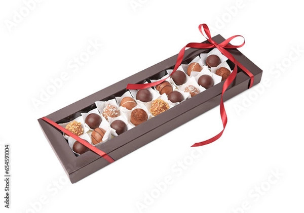 Fototapeta Box with delicious chocolate candies isolated on white