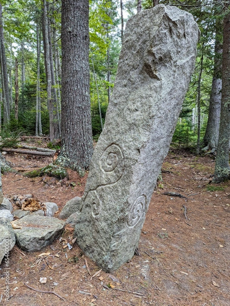 Fototapeta Symbols on an obelisk in a fairy garden 